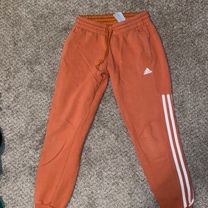 Orange Adidas drawstring sweat pants! Size XS. Super comfortable!
